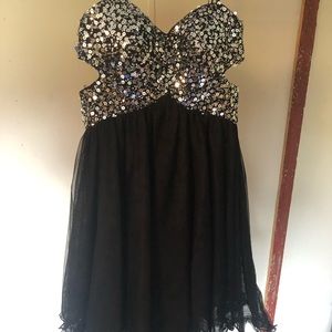 Strapless dress with side cut outs